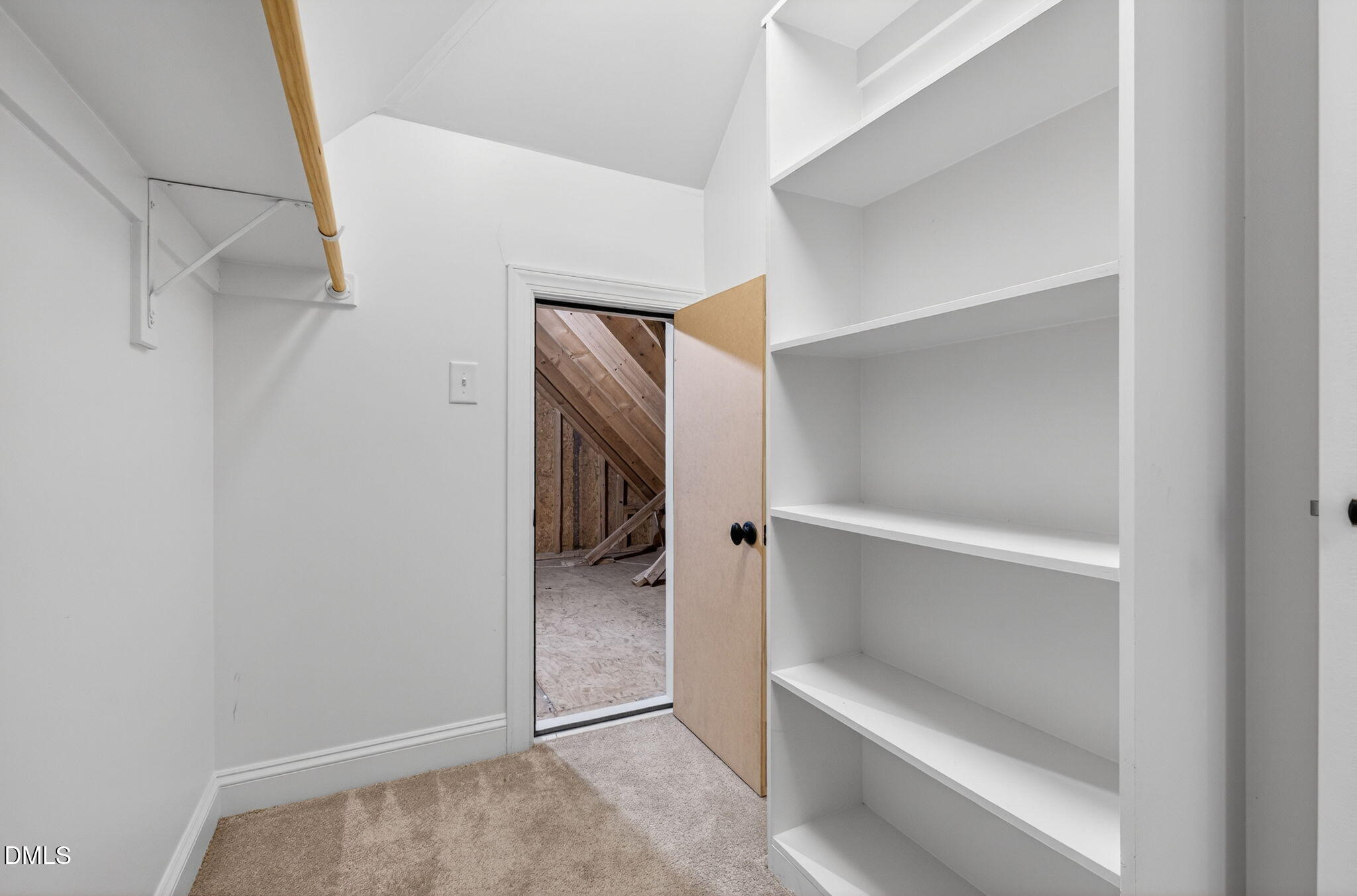 2700 Eastern Star Circle Rolesville, NC 27571 - Photo 46 of 75 a view of walk in closet with empty racks