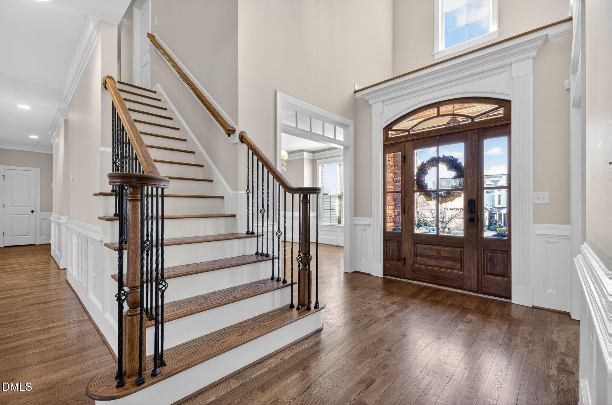 2700 Eastern Star Circle Rolesville, NC 27571 - Photo 5 of 75 a view of a hallway with wooden floor and staircase