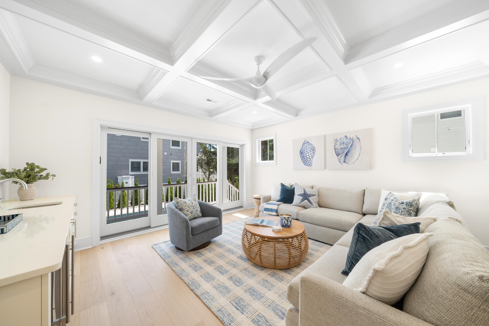 188 34th Street Avalon, NJ 08202 - Photo 22 of 47 a living room with furniture and a large window with outer view