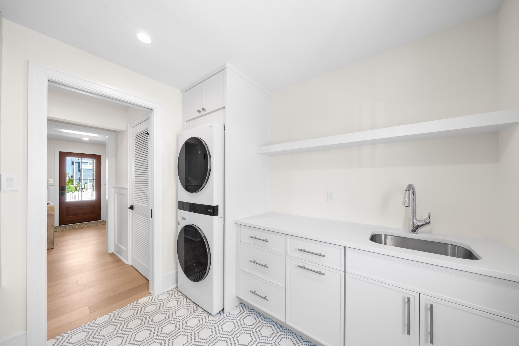 188 34th Street Avalon, NJ 08202 - Photo 26 of 47 a hallway with washer and dryer
