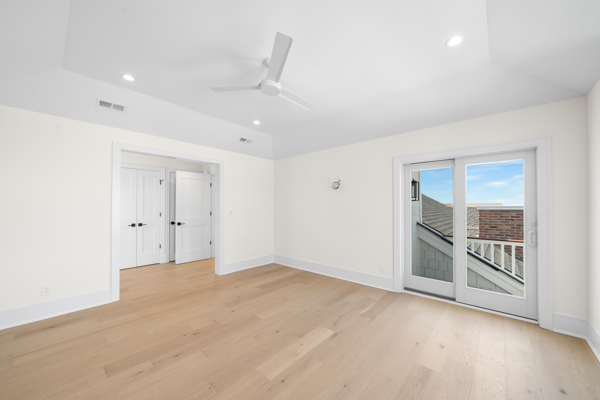 188 34th Street Avalon, NJ 08202 - Photo 34 of 47 wooden floor in an empty room with a window