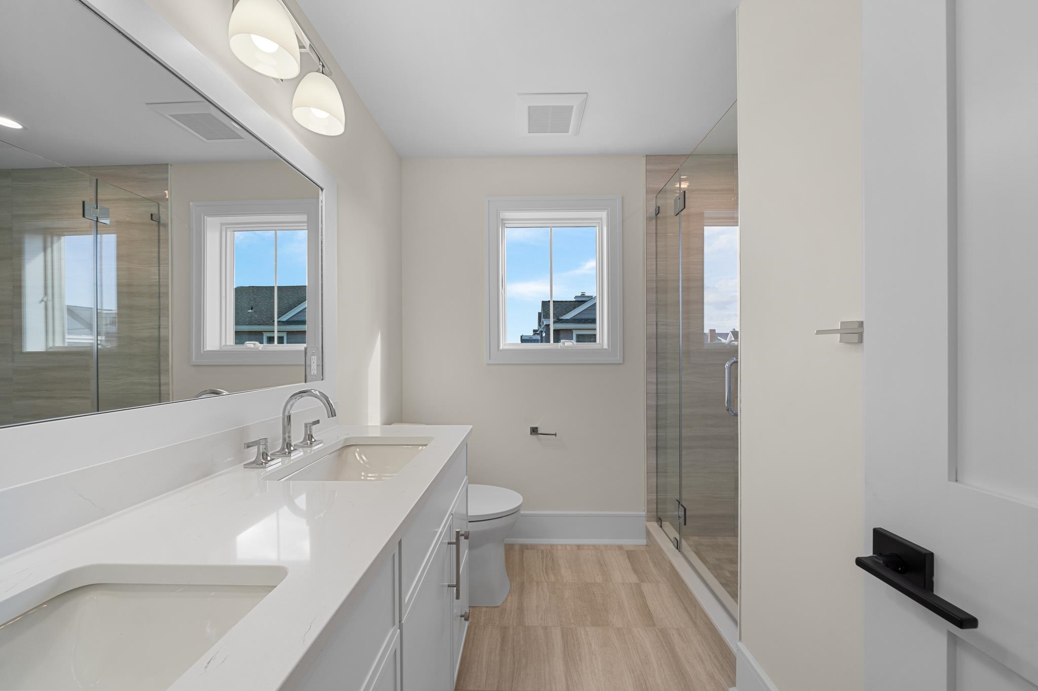 188 34th Street Avalon, NJ 08202 - Photo 40 of 47 a bathroom with a sink a toilet and shower