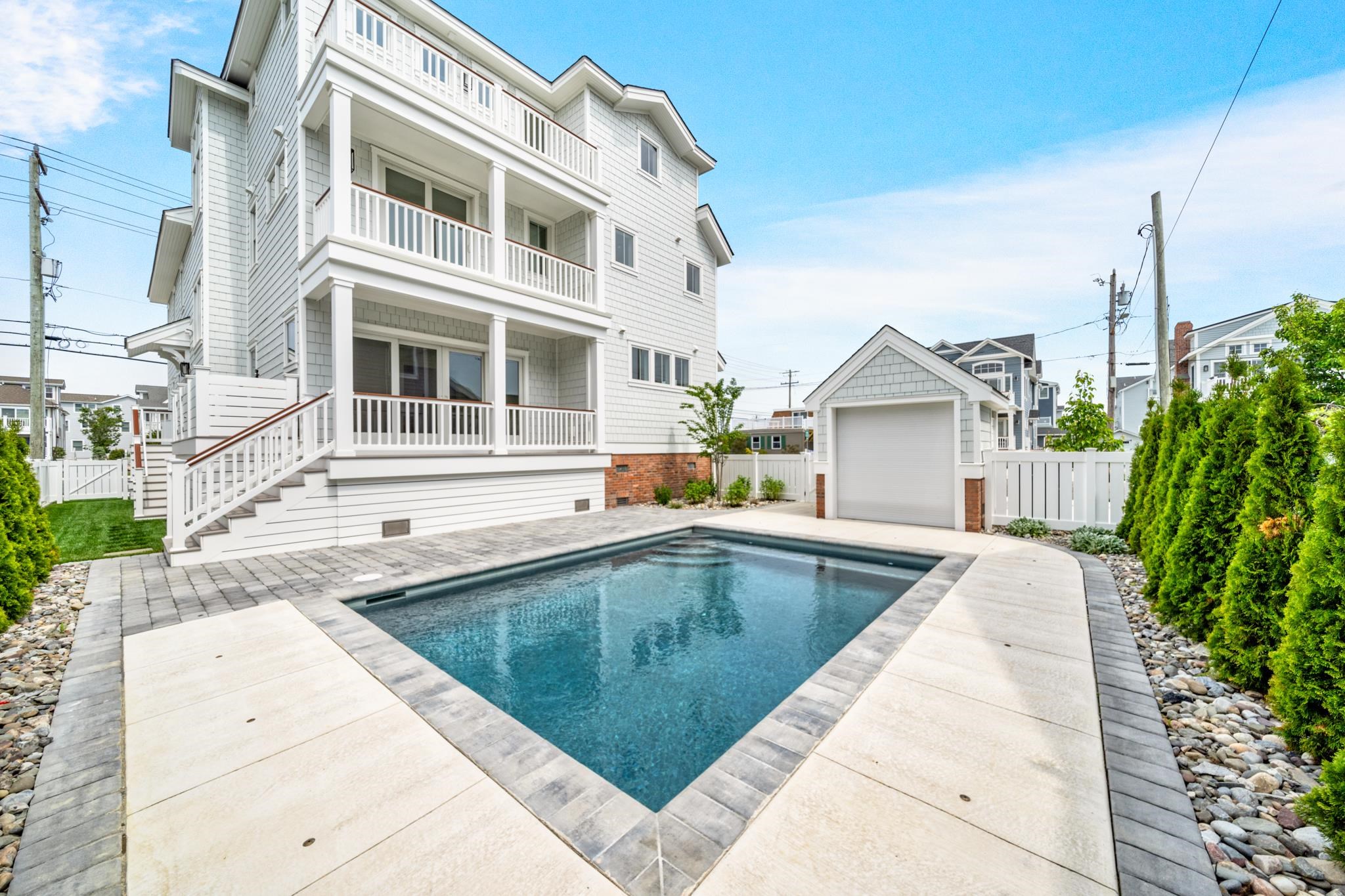 188 34th Street Avalon, NJ 08202 - Photo 8 of 47 a view of a house with pool and sitting area
