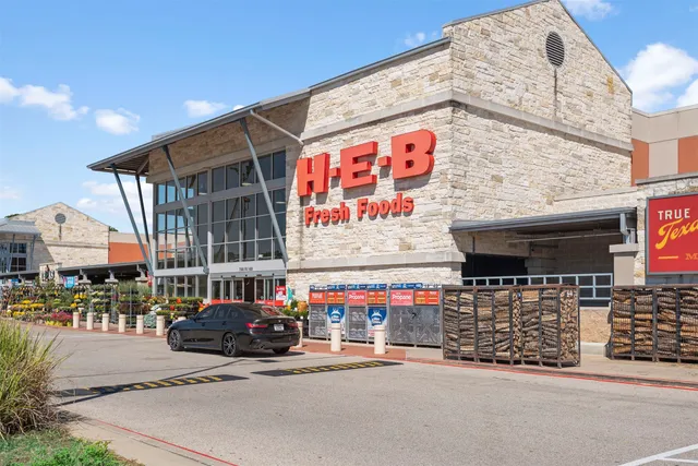 a view of a street with sign board