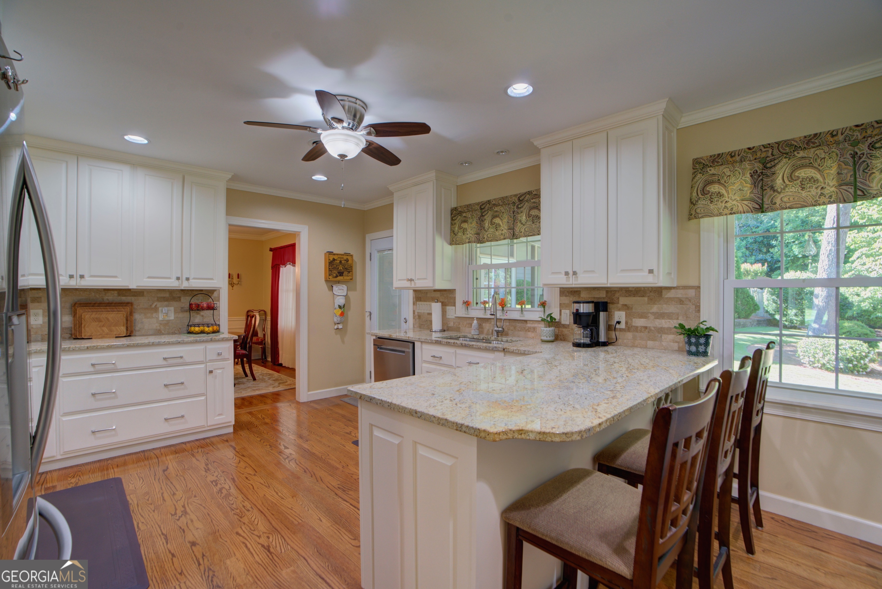204 Green View Road Southwest Rome, GA 30165 - Photo 33 of 62 a view of kitchen with granite countertop cabinets and wooden floor