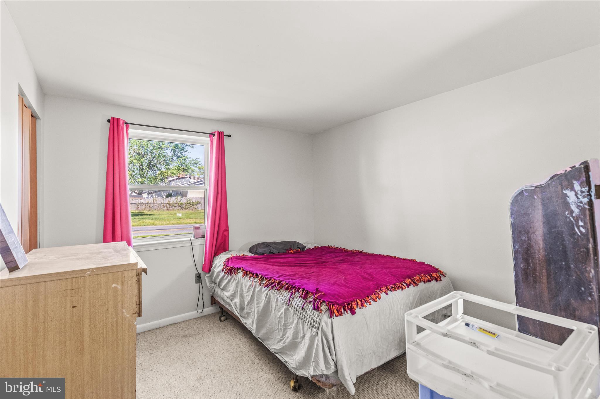 2219 Lodge Farm Road Sparrows Point, MD 21219 - Photo 19 of 36 a bedroom with a bed and a window