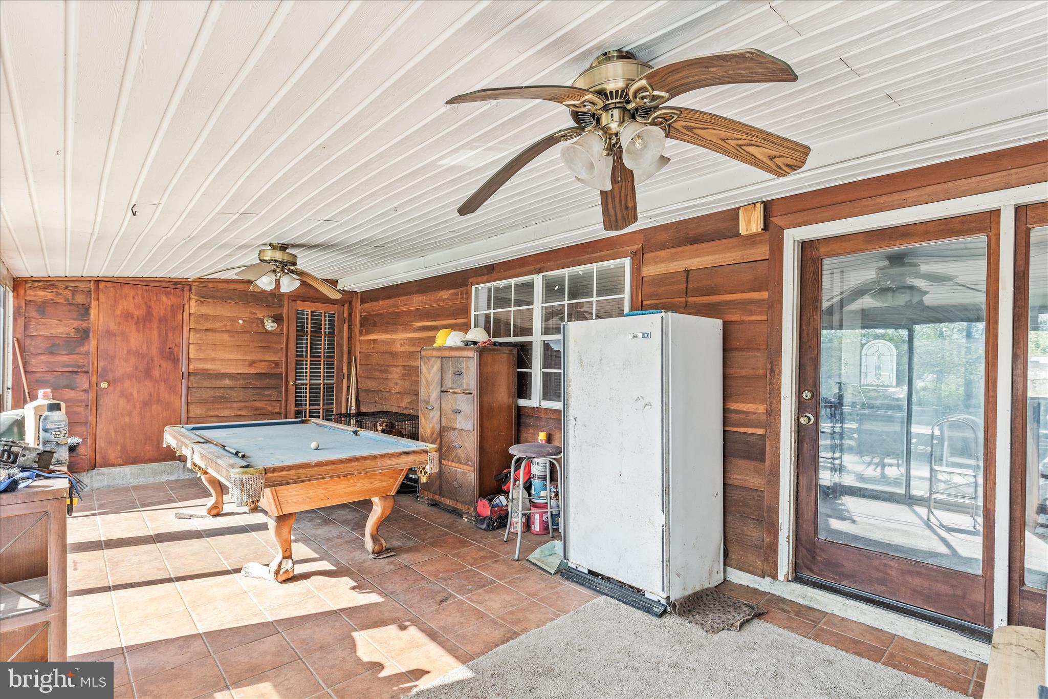 2219 Lodge Farm Road Sparrows Point, MD 21219 - Photo 29 of 36 a room with pool table and glass door
