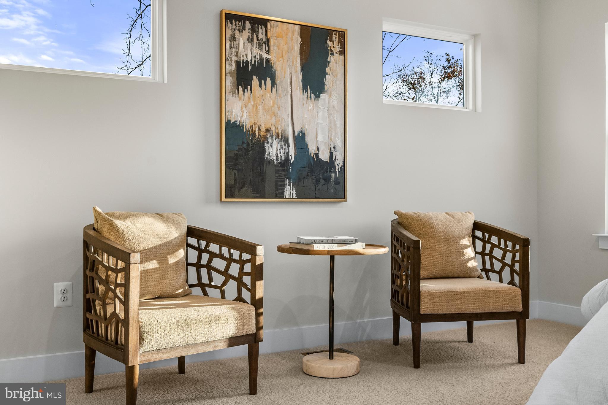 7505 Magarity Road Falls Church, VA 22043 - Photo 27 of 69 a view of a bedroom with furniture and painting on the wall