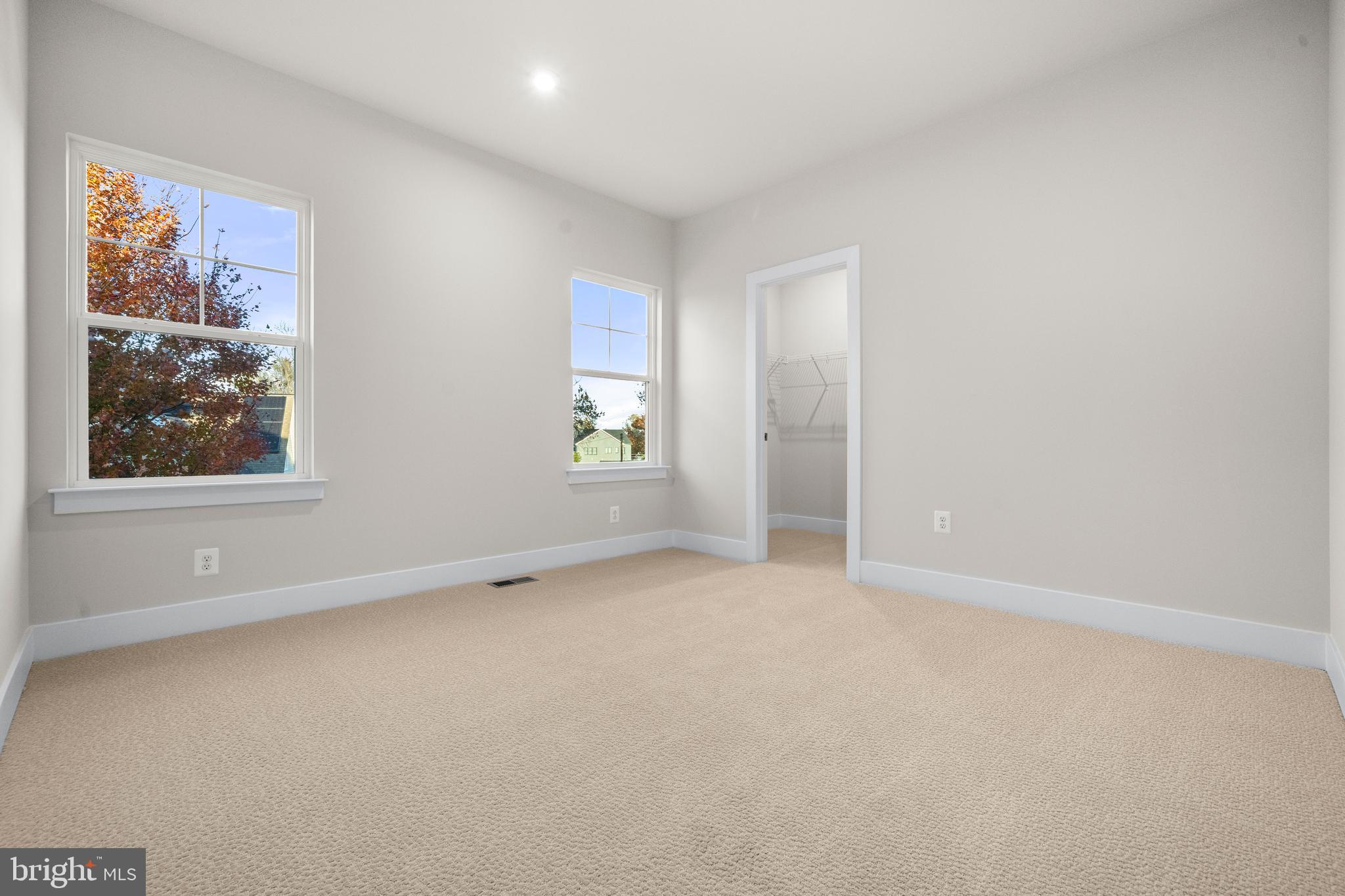 7505 Magarity Road Falls Church, VA 22043 - Photo 44 of 69 an empty room with windows and closet