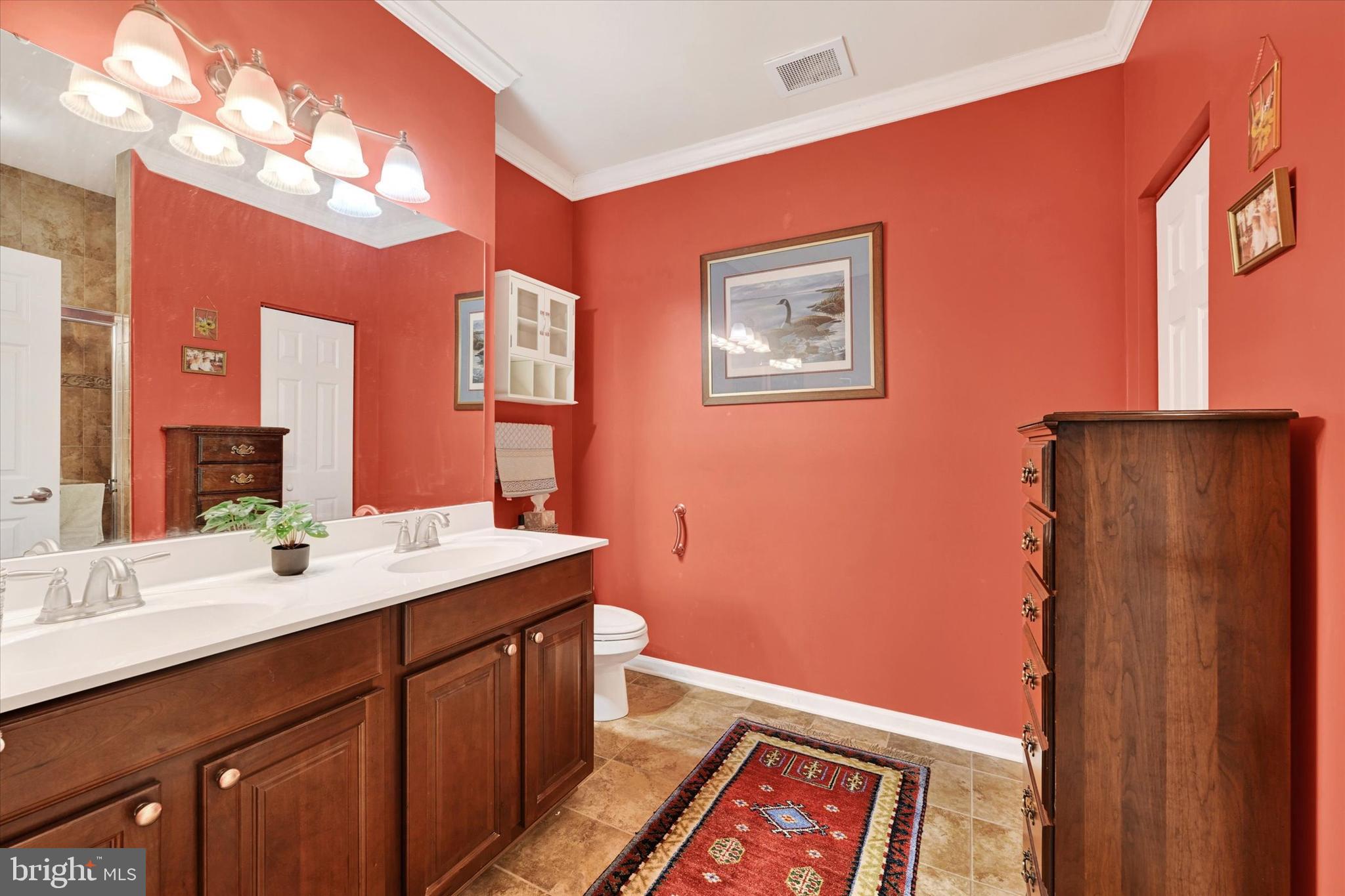 633 Wallingford Road, Unit 302 Bel Air, MD 21014 - Photo 18 of 26 a en suite bathroom with a sink vanity and a mirror