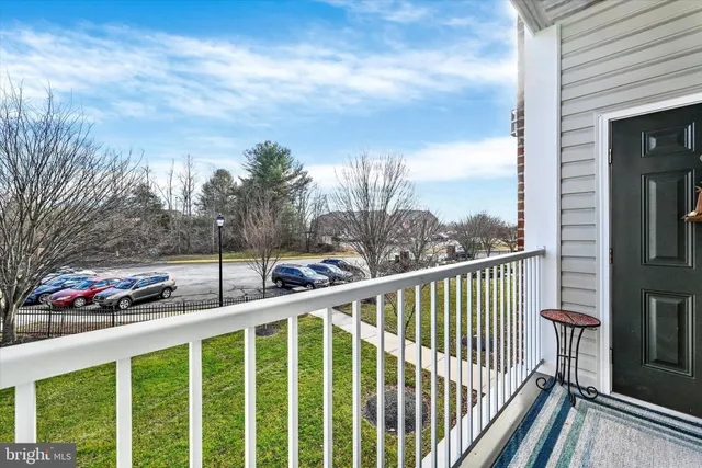 a view of a balcony with a potted plant