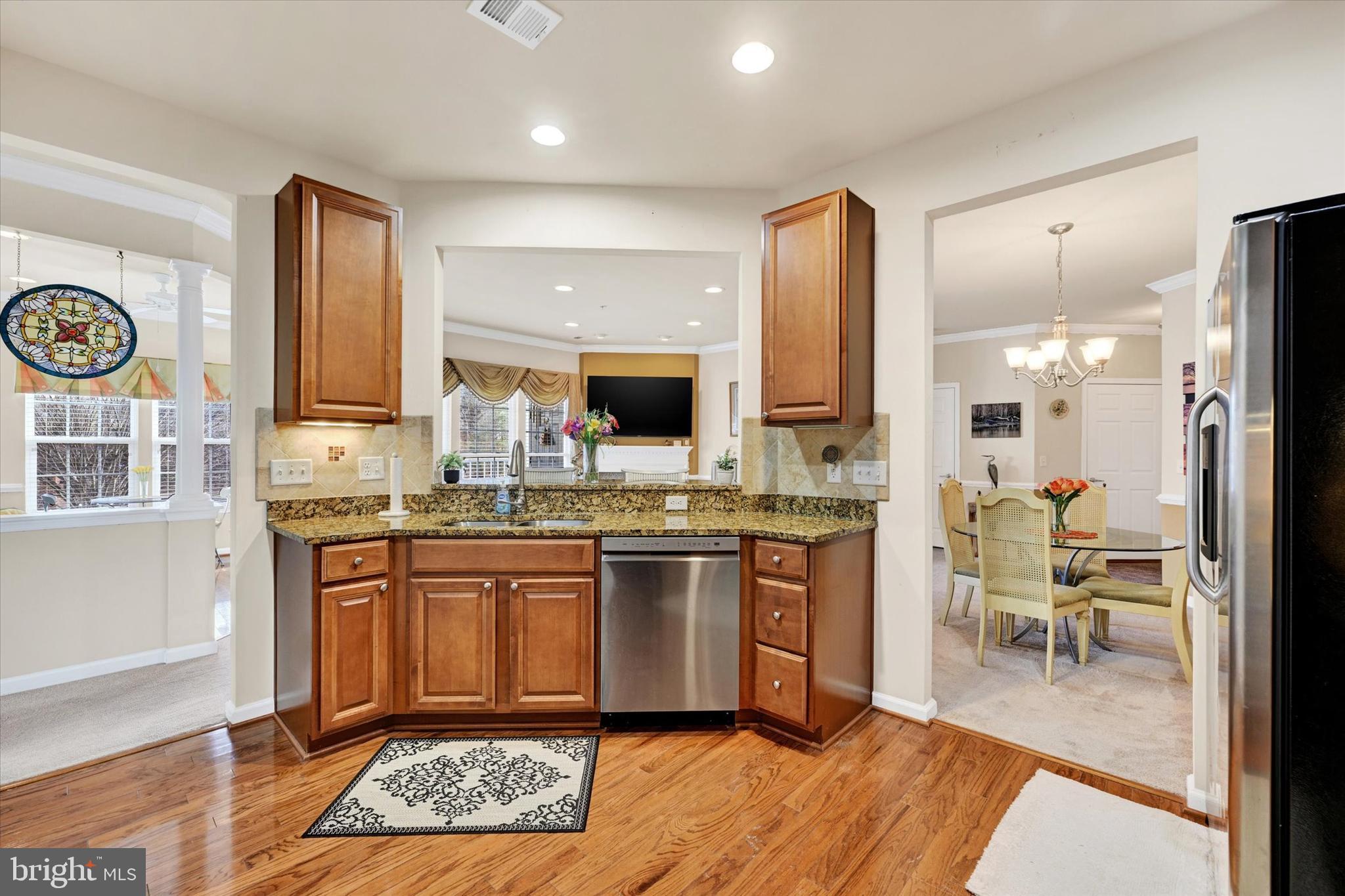 633 Wallingford Road, Unit 302 Bel Air, MD 21014 - Photo 8 of 26 a kitchen with stainless steel appliances granite countertop a stove and a sink
