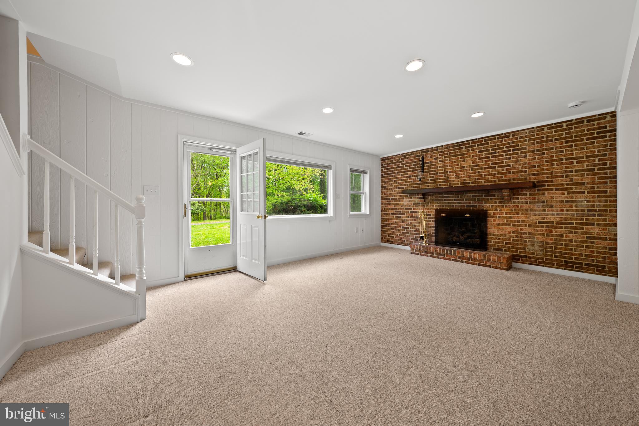 5681 Hardesty Road Sunderland, MD 20689 - Photo 33 of 49 Finished Lower Level with Gas Fireplace