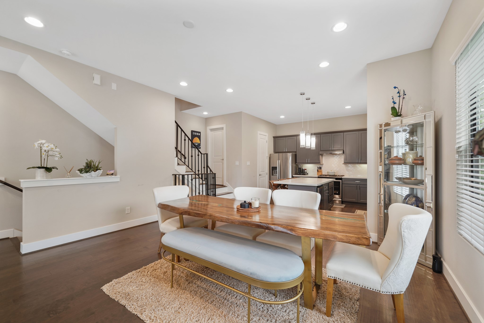 1824 Bonner Street Houston, TX 77007 - Photo 13 of 39 a living room with furniture kitchen view and a wooden floor