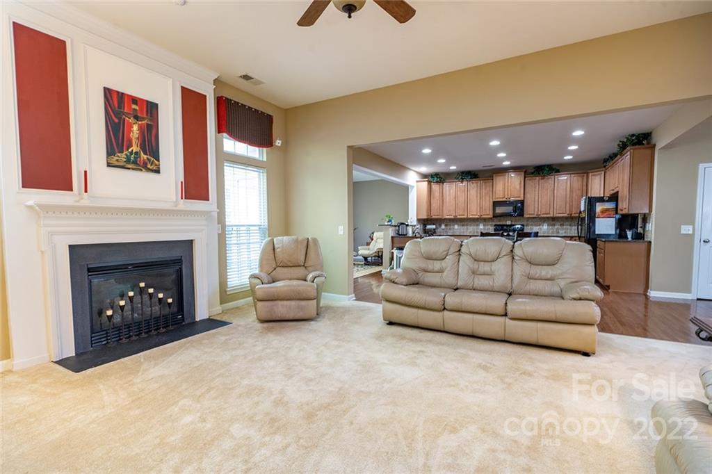 225 Fischer Road Fort Mill, SC 29715 - Photo 12 of 32 a view of a livingroom with furniture and a fireplace