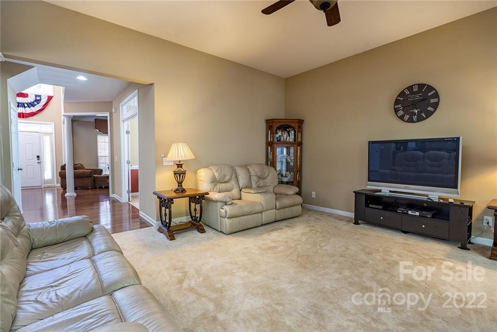 225 Fischer Road Fort Mill, SC 29715 - Photo 14 of 32 a living room with furniture and a flat screen tv