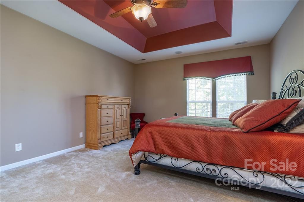 225 Fischer Road Fort Mill, SC 29715 - Photo 22 of 32 a bedroom with a bed and a window