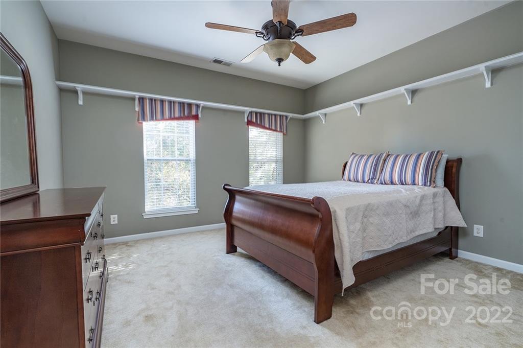 225 Fischer Road Fort Mill, SC 29715 - Photo 29 of 32 a bedroom with a bed and window