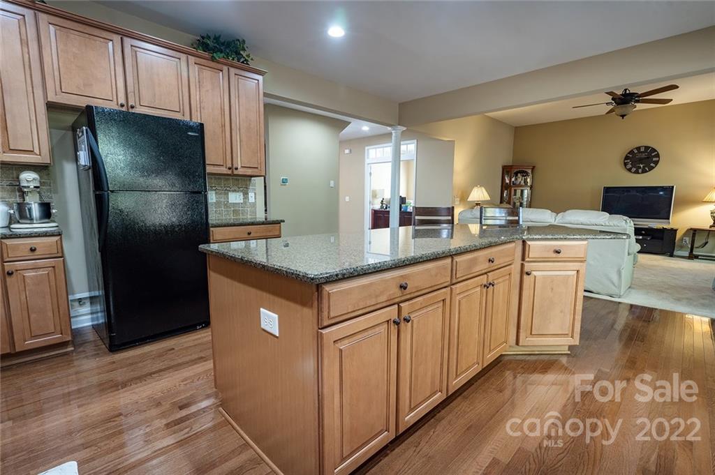 225 Fischer Road Fort Mill, SC 29715 - Photo 5 of 32 a kitchen with stainless steel appliances granite countertop a refrigerator and a stove
