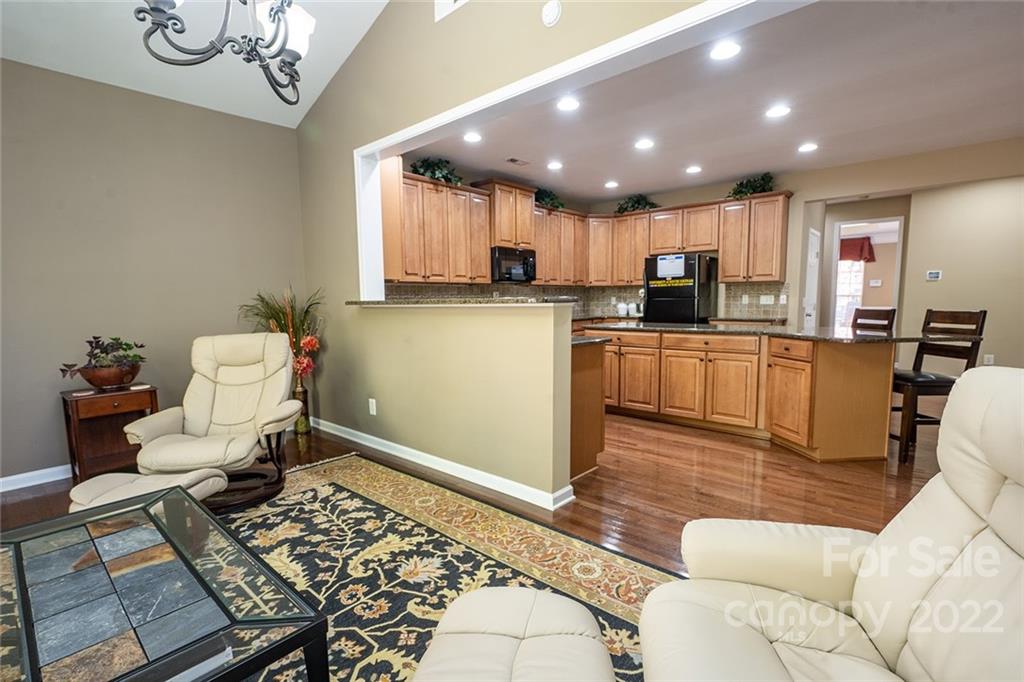 225 Fischer Road Fort Mill, SC 29715 - Photo 10 of 32 a kitchen with a refrigerator and a sink