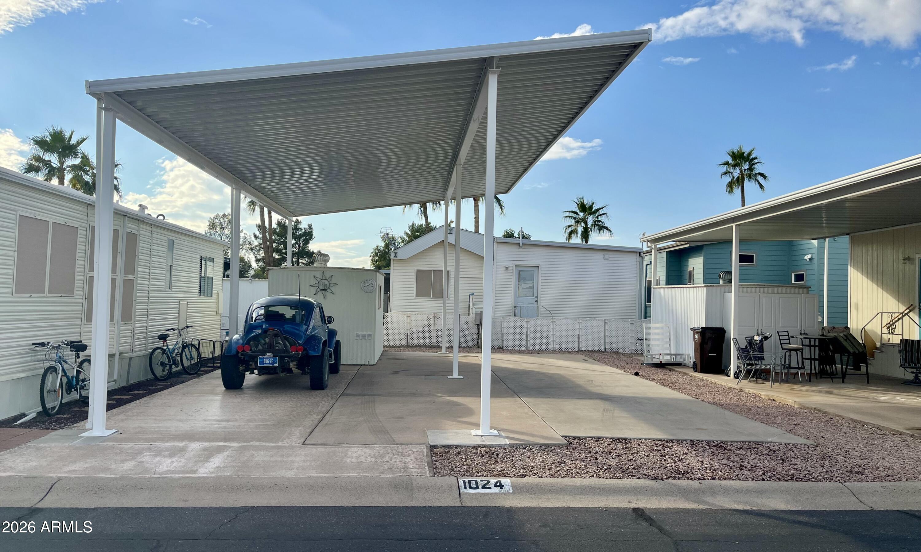 1024 Prospector Drive, Unit 1024 Apache Junction, AZ 85119 - Photo 3 of 40 a view of a house with a patio