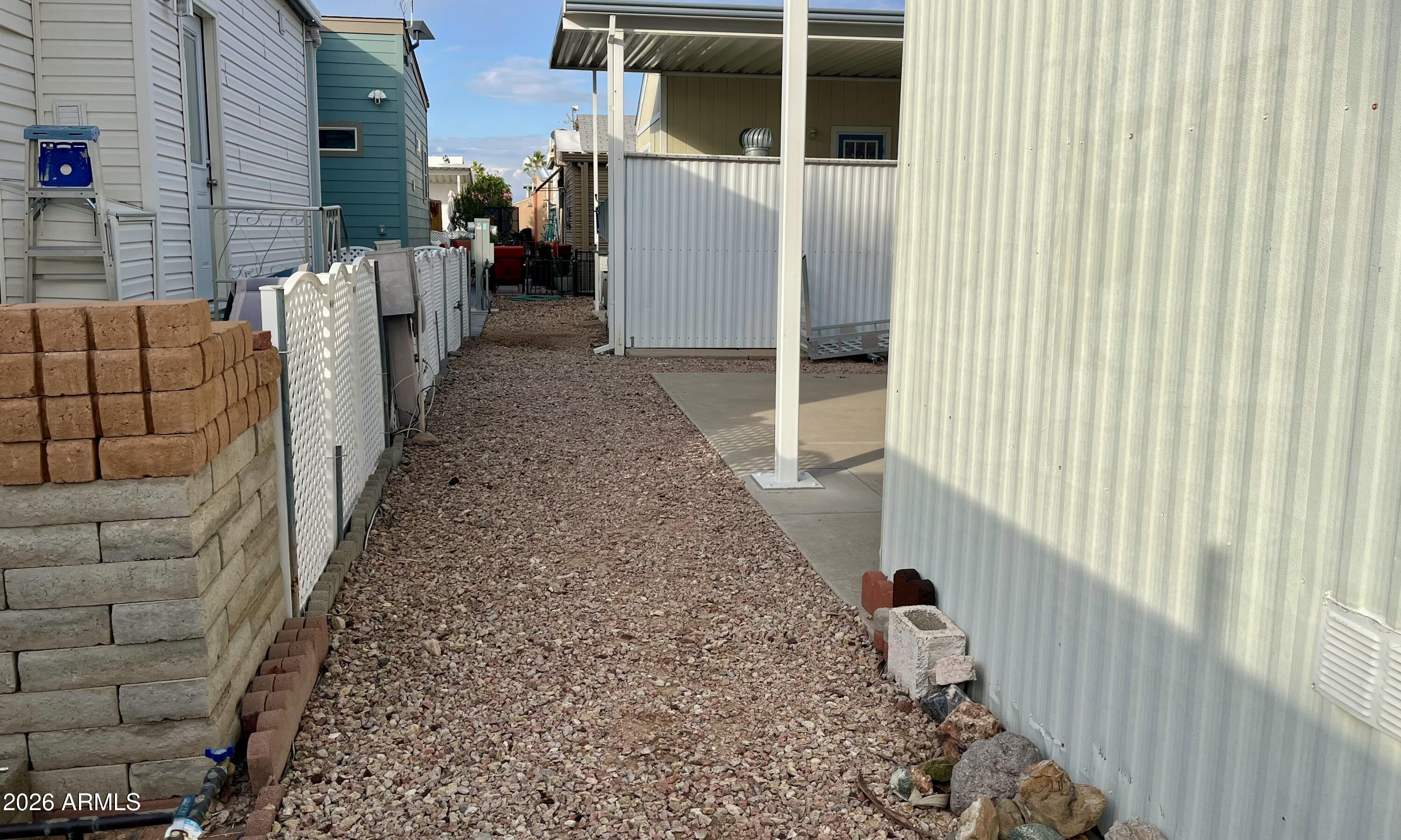 1024 Prospector Drive, Unit 1024 Apache Junction, AZ 85119 - Photo 8 of 40 a view of a porch with a door
