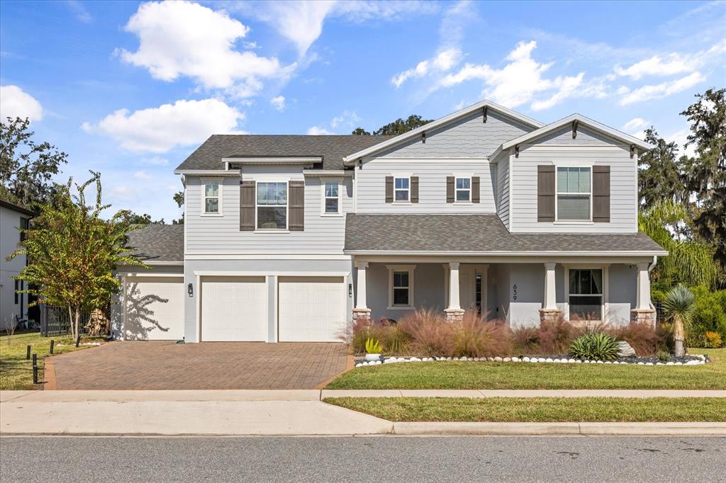 639 Primrose Willow Way Apopka, FL 32712 - Photo 1 of 70 a front view of a house with a yard