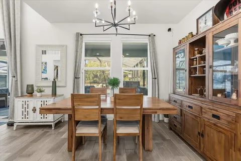 a bathroom with a double vanity sink and mirror