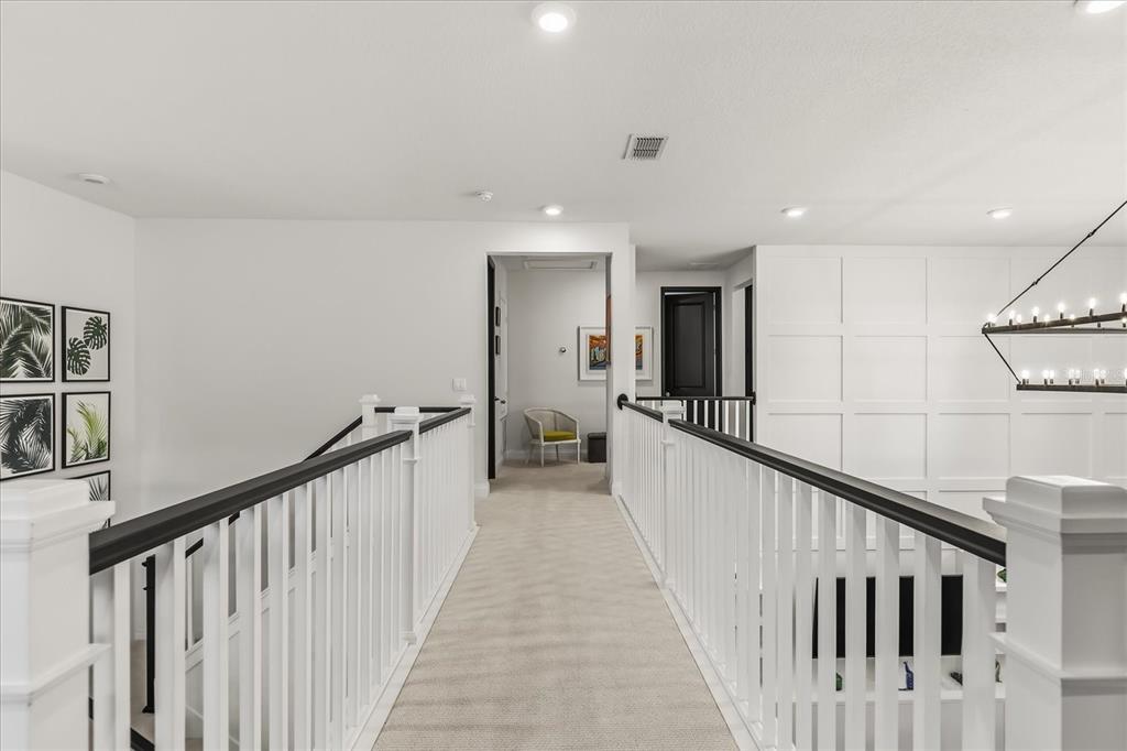 639 Primrose Willow Way Apopka, FL 32712 - Photo 30 of 70 a view of a hallway with a livingroom and stairs