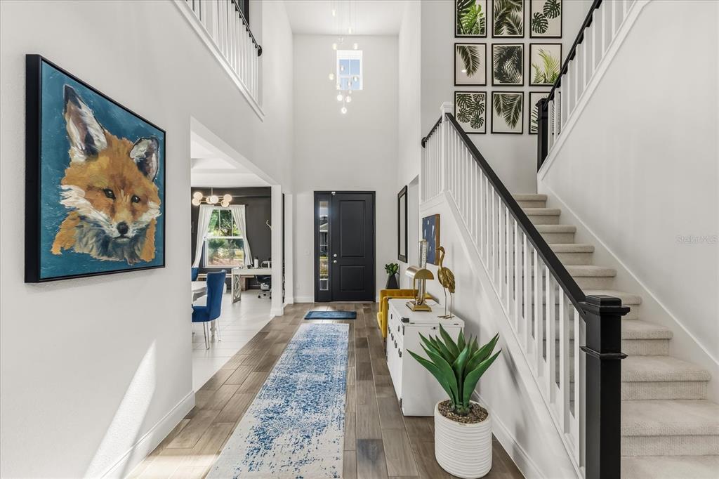 639 Primrose Willow Way Apopka, FL 32712 - Photo 6 of 70 a view of entryway and hall with wooden floor