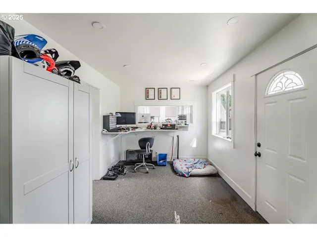 a bathroom with a sink a mirror and a window