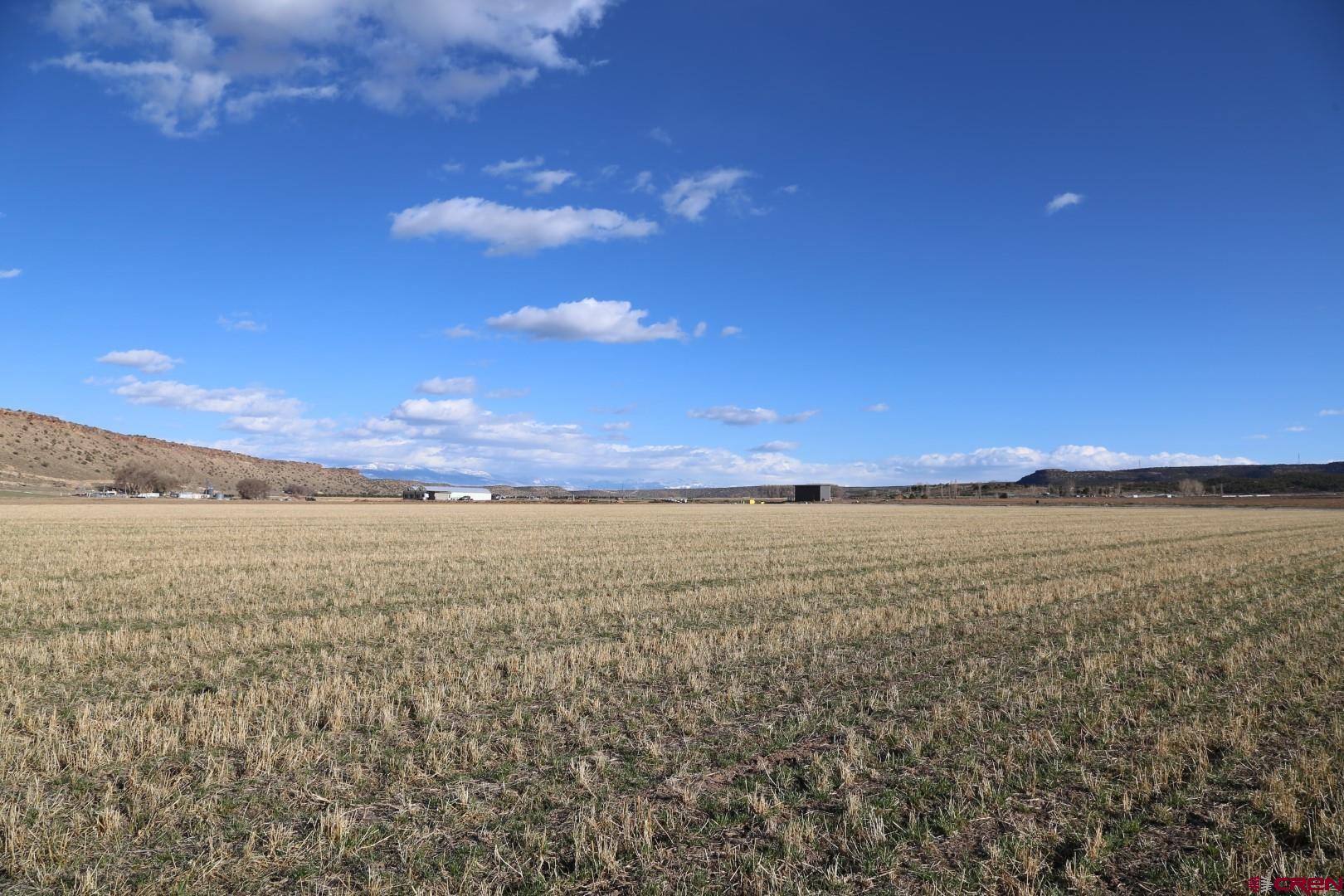 a view of an ocean in between the mountain