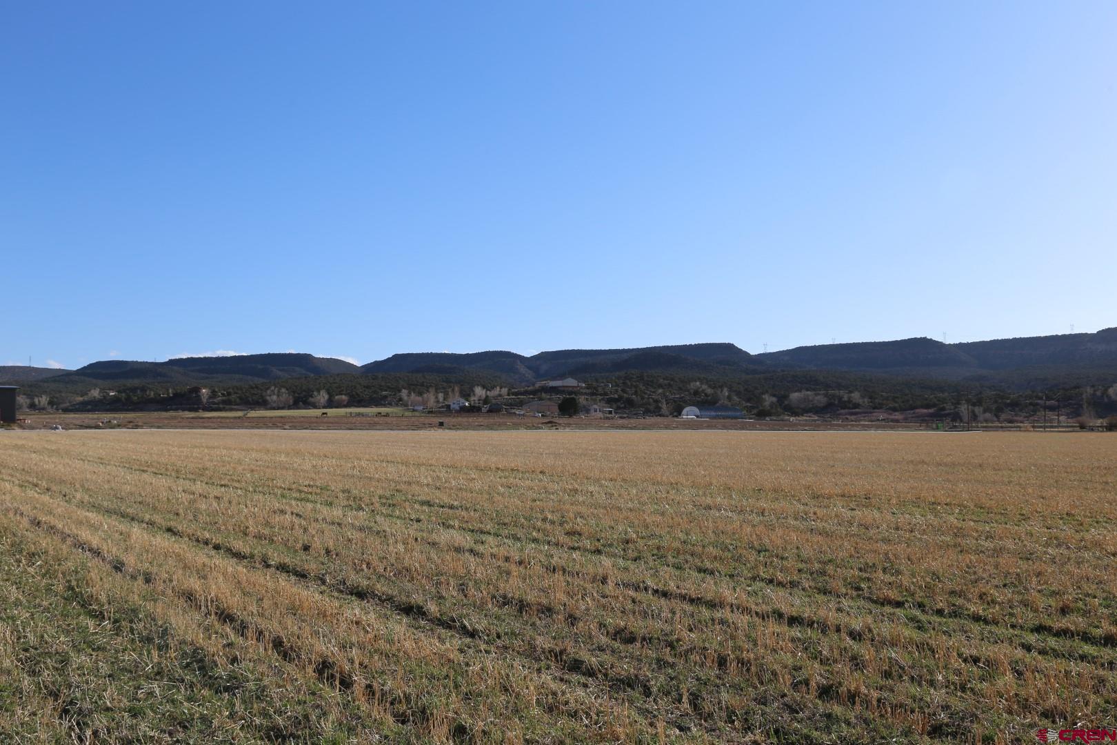 Lucatbd Lot 1 5790th Road Montrose, CO 81403 - Photo 5 of 8 a view of lake with mountain