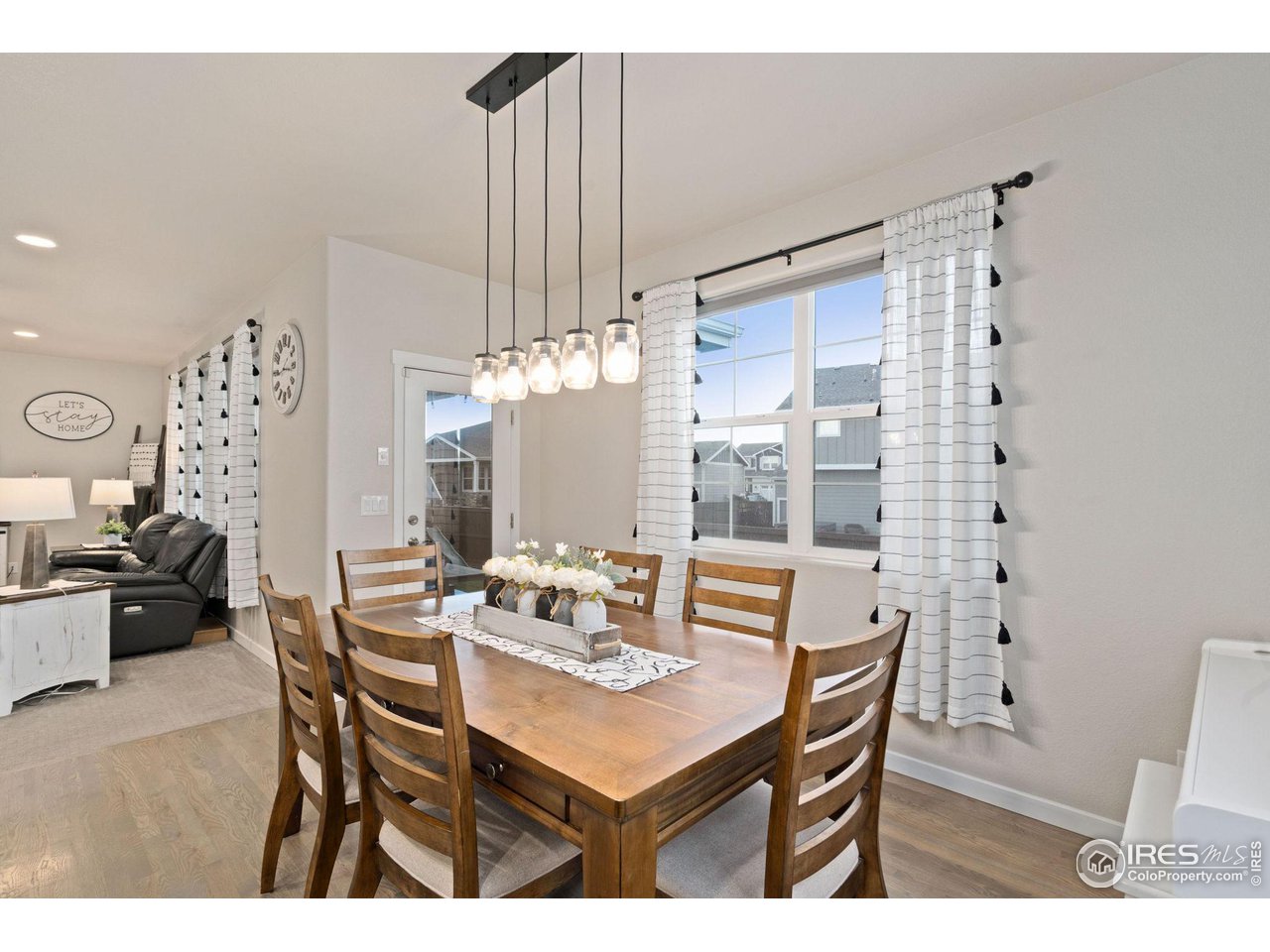 2167 First Light Court Windsor, CO 80550 - Photo 13 of 40 a dining room with furniture and window