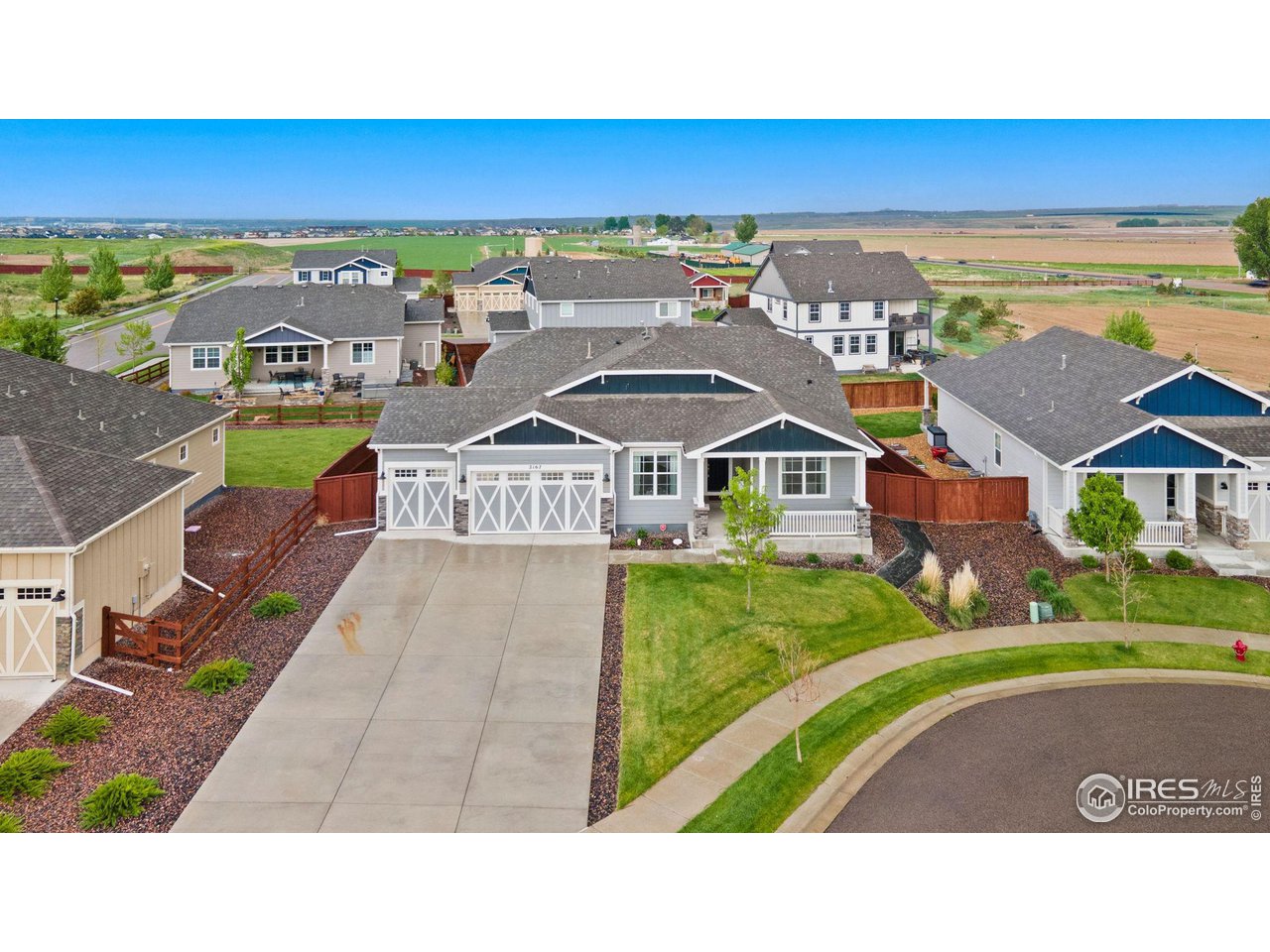 2167 First Light Court Windsor, CO 80550 - Photo 3 of 40 a view of a city with an ocean