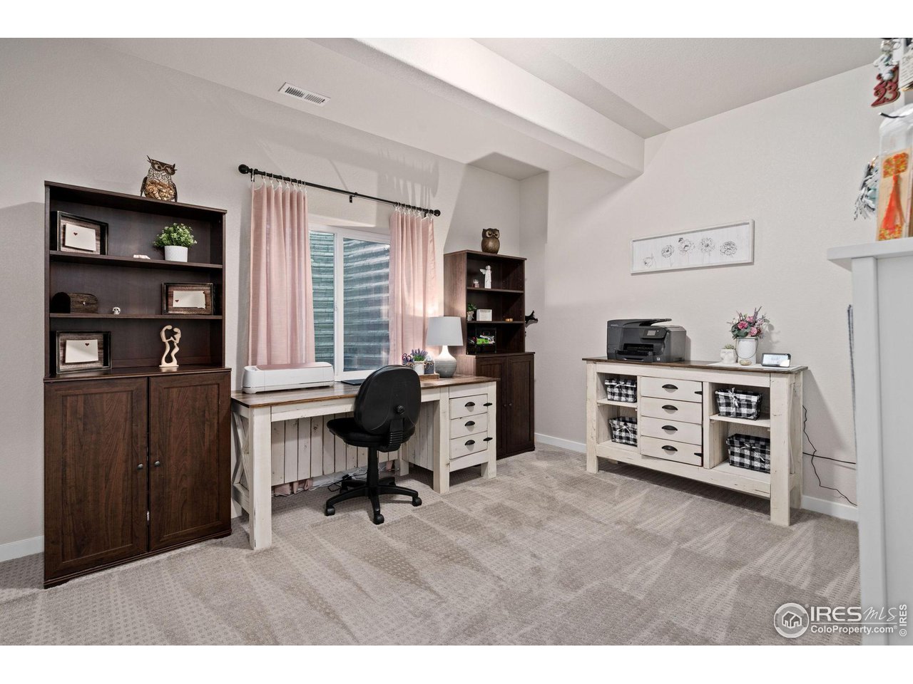 2167 First Light Court Windsor, CO 80550 - Photo 33 of 40 a bedroom with a workspace