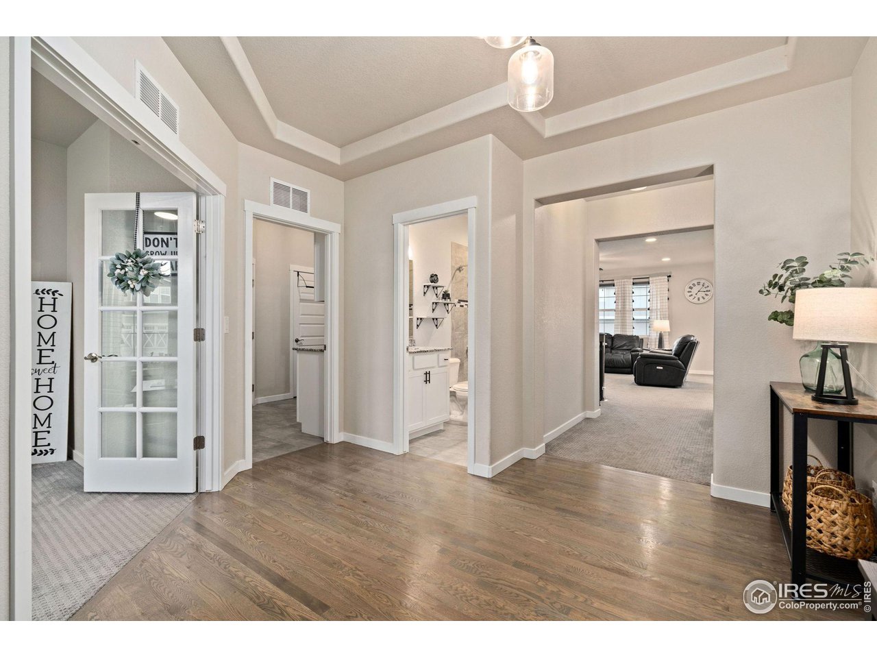 2167 First Light Court Windsor, CO 80550 - Photo 6 of 40 a view interior of a house and wooden floor
