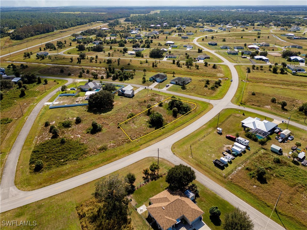 Jay Terrace LaBelle, FL 33935 - Photo 7 of 10 an aerial view of a pool patio and mountain view
