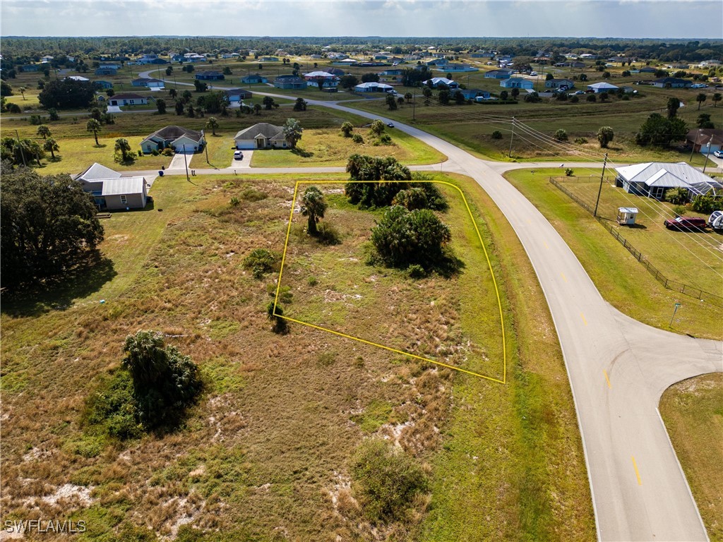 Jay Terrace LaBelle, FL 33935 - Photo 8 of 10 a view of a swimming pool with outdoor seating