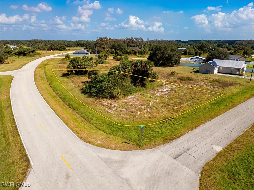 Jay Terrace LaBelle, FL 33935 - Photo 9 of 10 a view of a swimming pool with outdoor seating