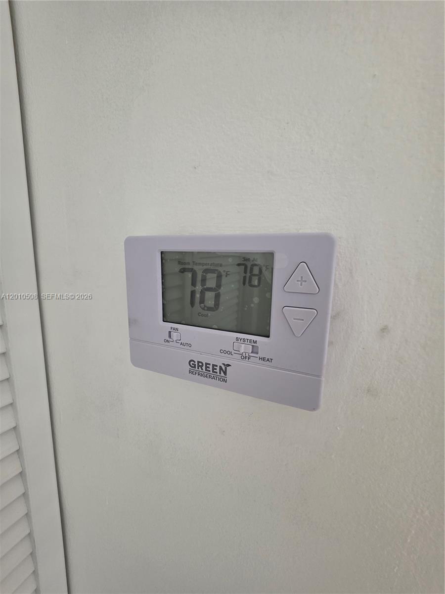 14775 Southwest 83rd Lane, Unit 14775 Miami, FL 33193 - Photo 6 of 26 a/c thermostate replaced