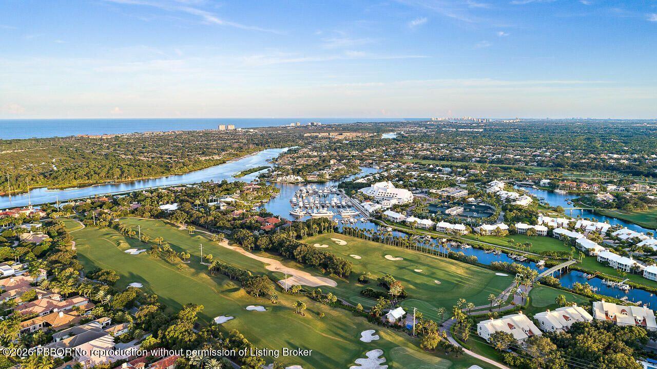 3501 Captains Way, Unit 3501 Jupiter, FL 33477 - Photo 28 of 41 an aerial view of residential houses with outdoor space