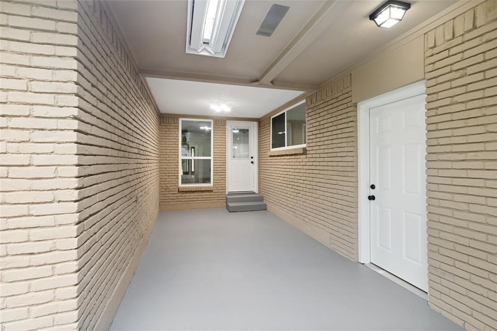 9552 Timberleaf Drive Dallas, TX 75243 - Photo 28 of 32 a view of a house with a porch