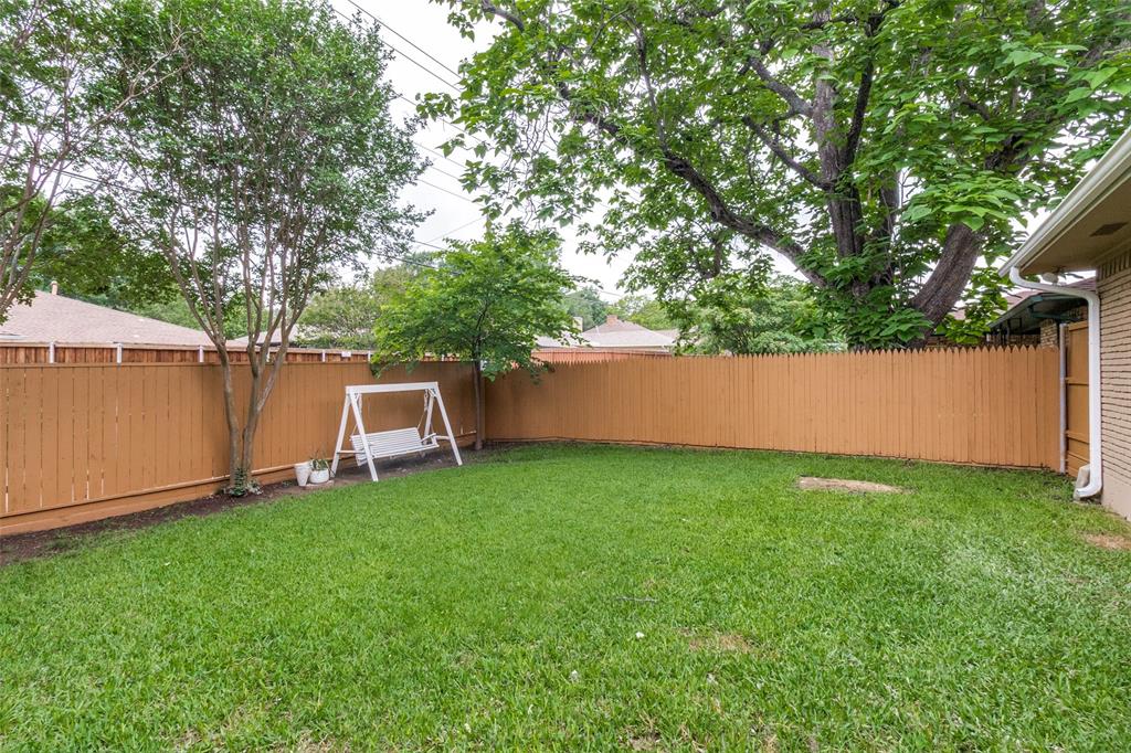 9552 Timberleaf Drive Dallas, TX 75243 - Photo 32 of 32 a view of a backyard with a small cabin