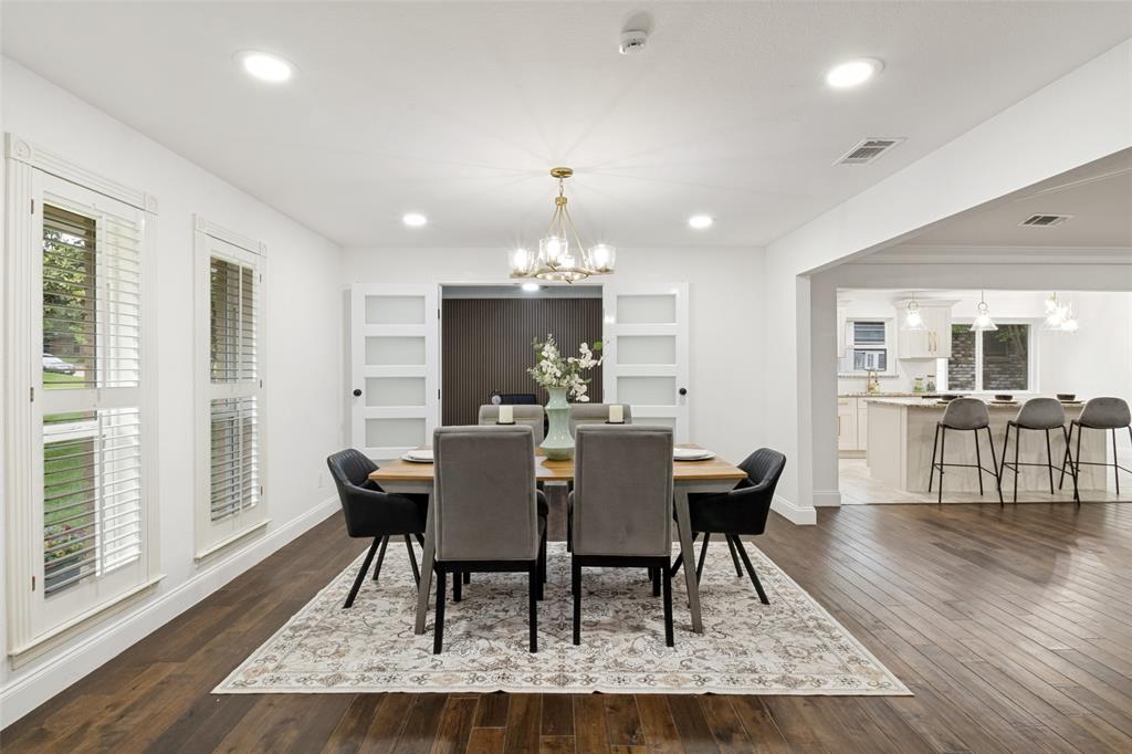 9552 Timberleaf Drive Dallas, TX 75243 - Photo 6 of 32 a view of a dining room with furniture window and wooden floor