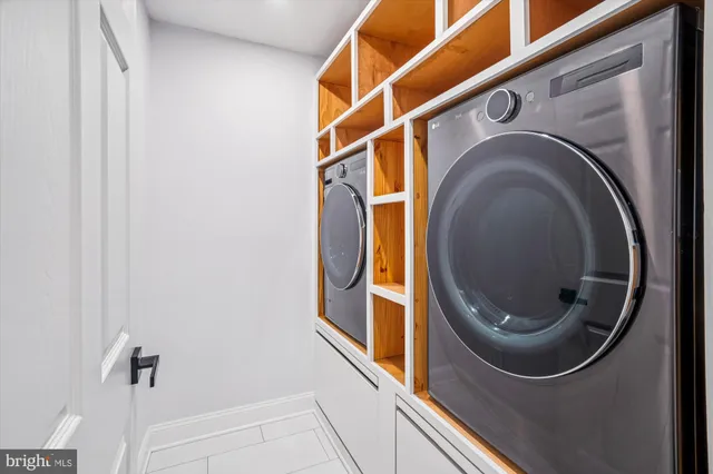 a view of a brick house with a yard