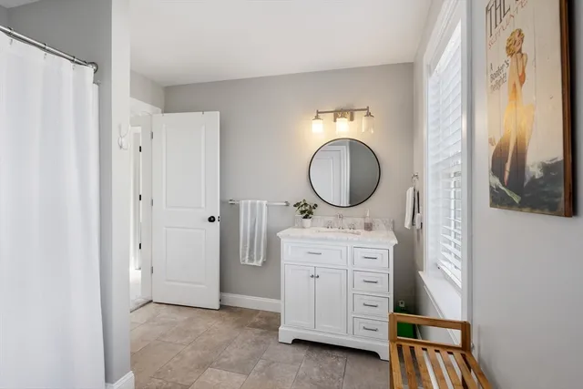 a view of a sink and a mirror