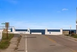 a backyard of a house with large tree