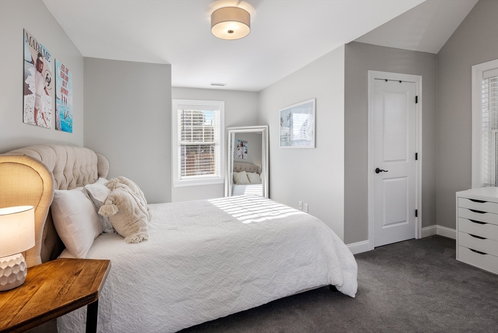 16 R Gannett Road Scituate, MA 02066 - Photo 8 of 22 a bedroom with a bed and closet