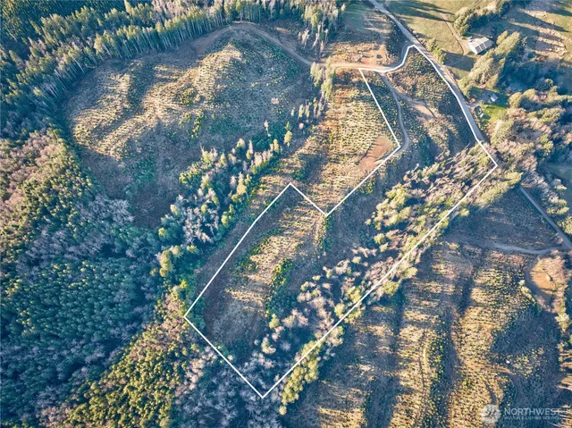 a view of a lake in middle of the town